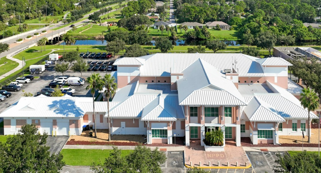 North Port Police Station roof replacement custom gutters by Crowthe Roofing and Cooling