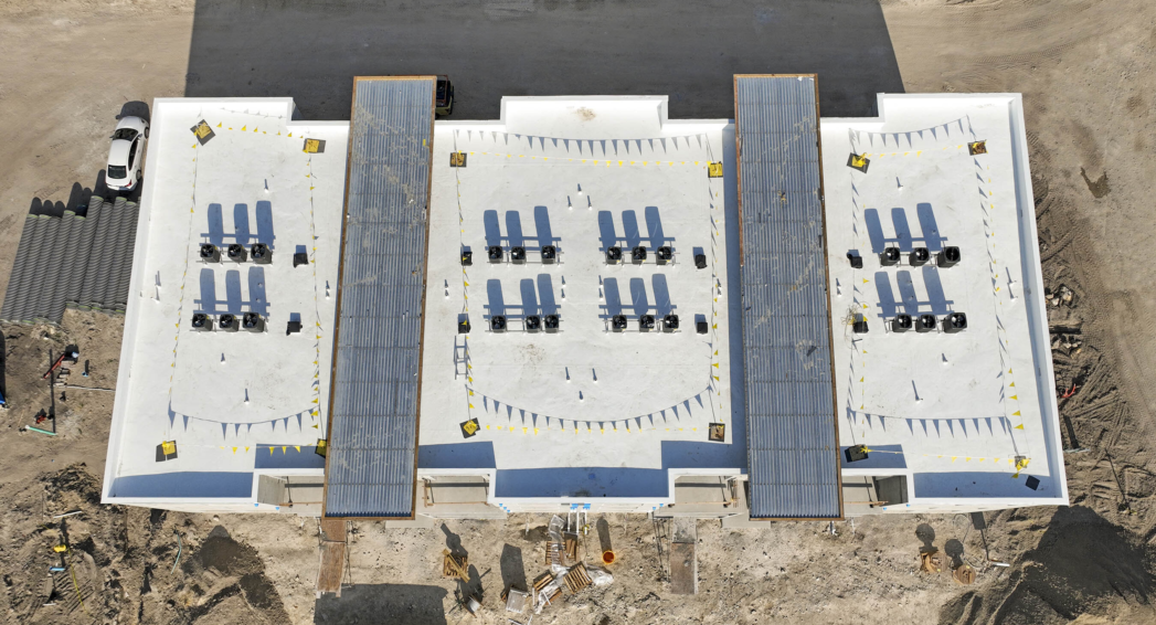 New Flat Roofing and HVAC units installed at Renaissance Hall Apartments in Naples by Crowther Roofing and Cooling