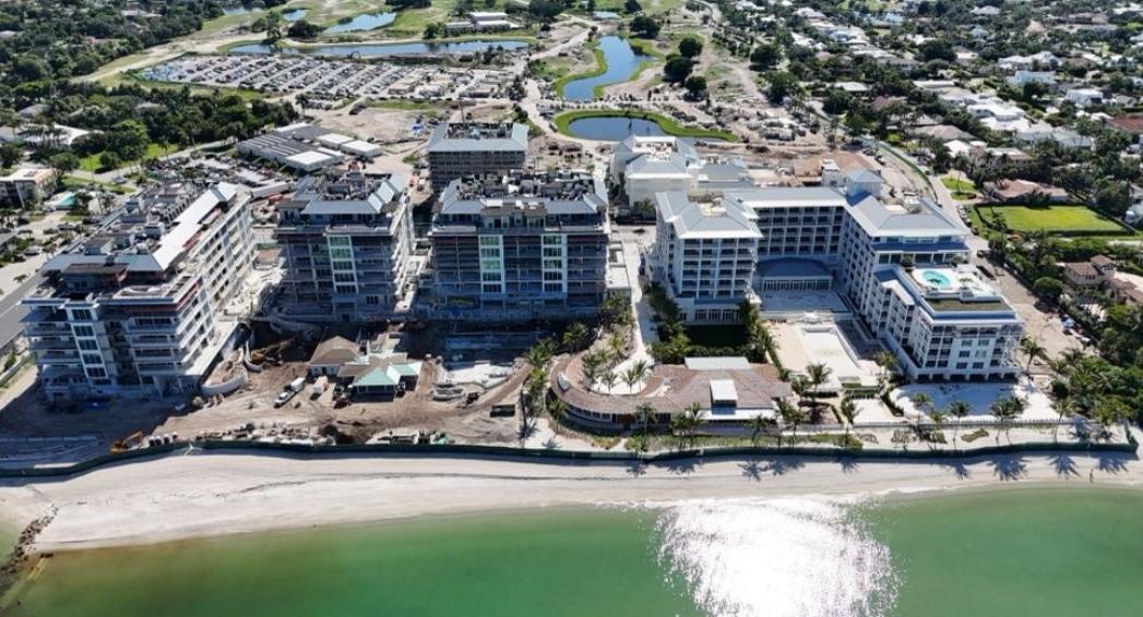 Naples Beach Club gulf view of roof replacement by Crowther Roofing Cooling serving Fort Myers Sarasota Jupiter
